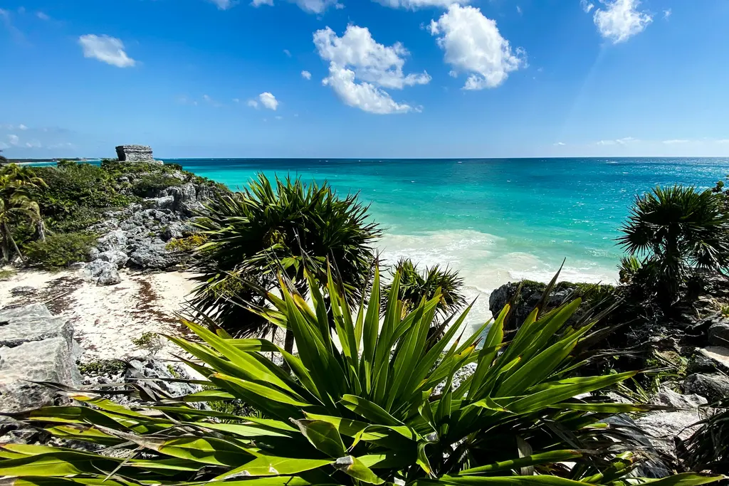 Tulum turquoise sea seen from the jungle