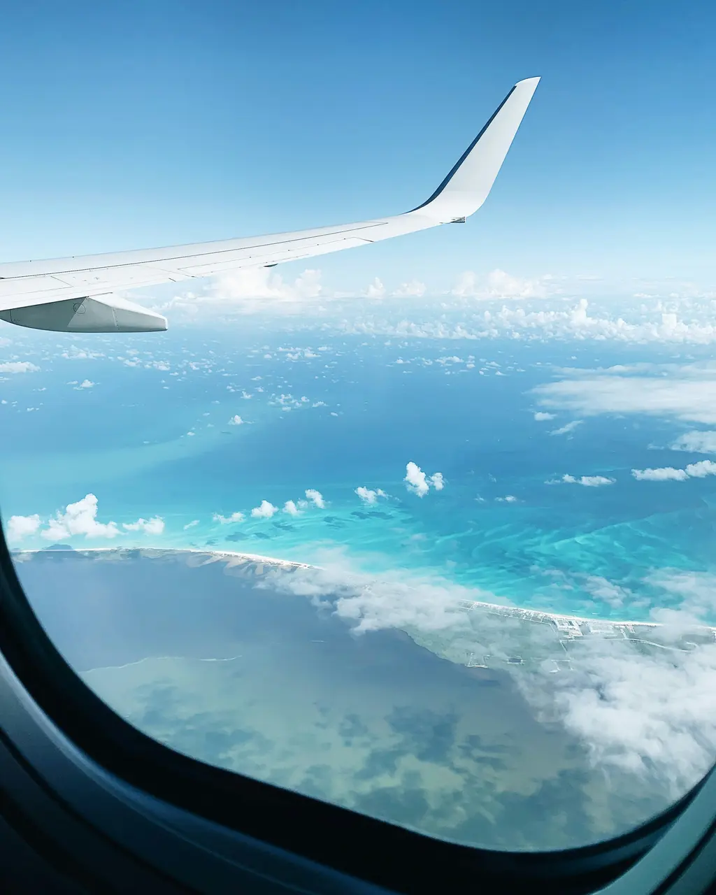View from the airplane window over the Mexican Caribbean